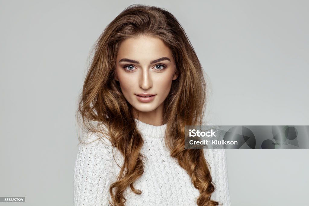 Beautiful female model face Brown Hair Stock Photo