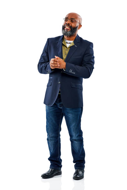 Portrait of happy mature businessman standing on white background