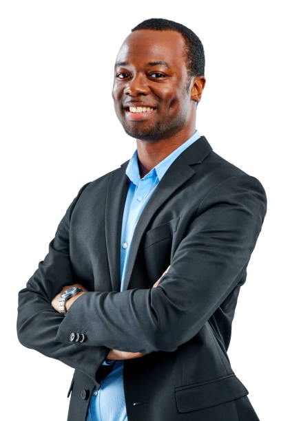 istock Confident young african businessman standing on white 653401360