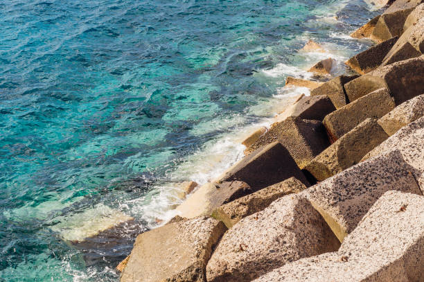 istock Pier and transparent turquoise water in sunlight 653401814