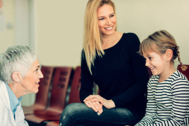 istock Mother and daughter at dentist office 653402490