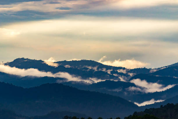 istock Mountain nature of misty clouds fast movement 653408272