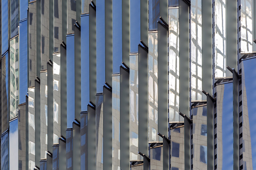 Extreme close up of the glass windows exterior of One World Trade Center in New York