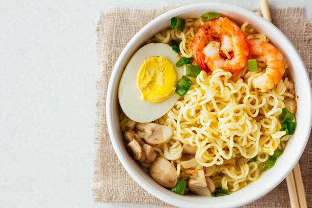 istock Noodles with shrimps, mushrooms and egg 653419344