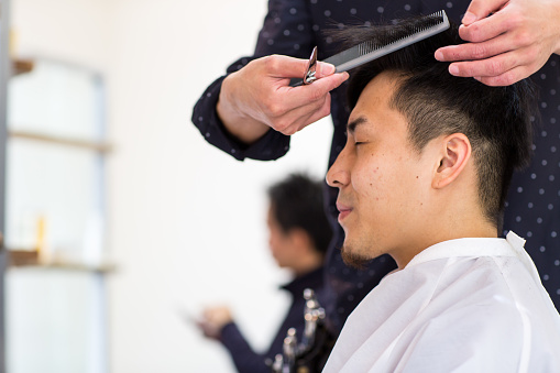 Young Man Get His Hair Cut And Styled At A Hair Salon Stock Photo -  Download Image Now - iStock