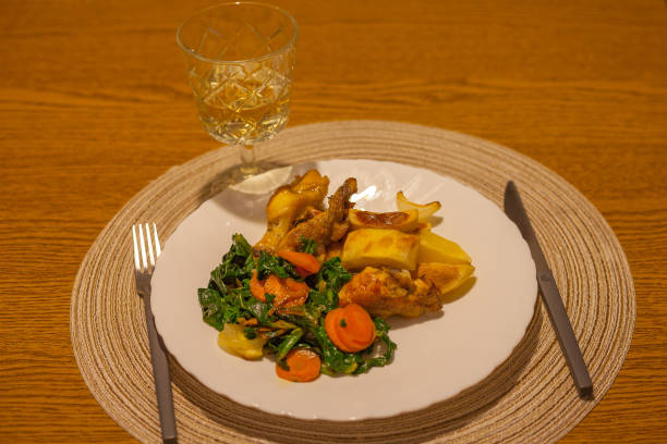 istock Lunch with chicken, onions, carrots, spinach 653460406