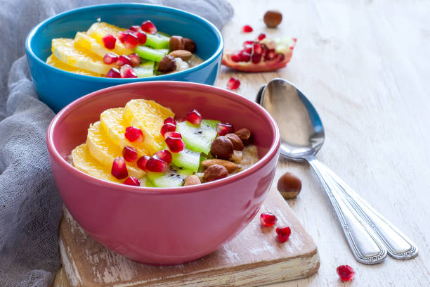 istock Oatmeal with fruit and nuts for a healthy breakfast 653460476