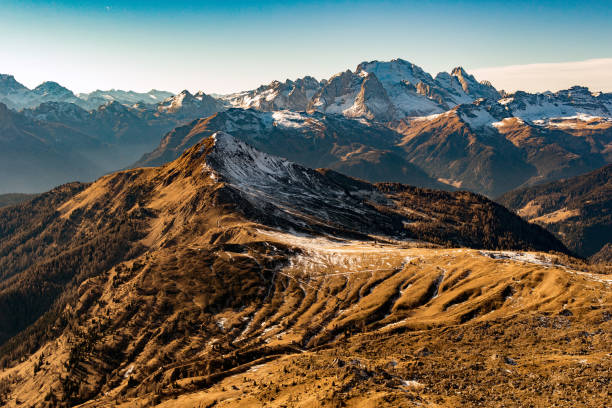 istock Dolomites huge panorama landscape view in spring little snow time 653463394