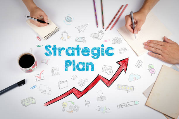 istock Strategic Plan Concept. The meeting at the white office table 653464632