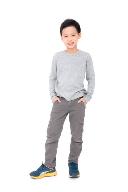 boy smiles over white background stock photo
