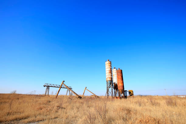 istock Concrete mixing tower. Concept of on-site construction facility 653482314