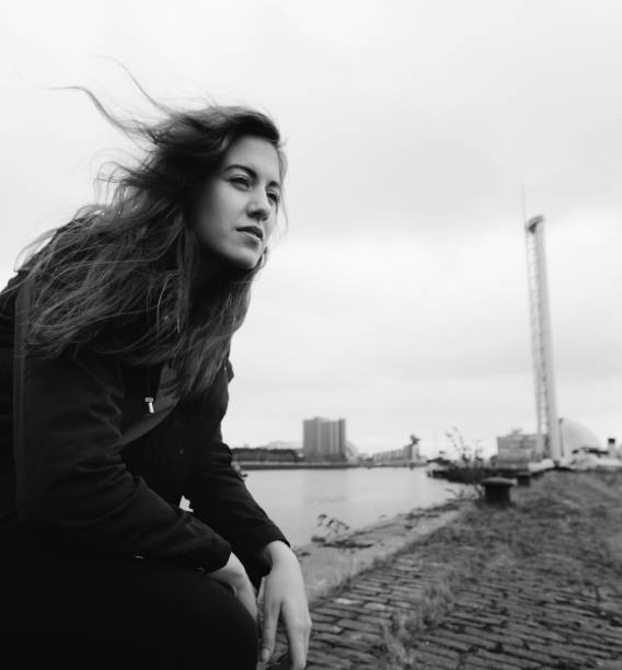 istock Attractive Young Woman At Derelict Glasgow Docks 653487352