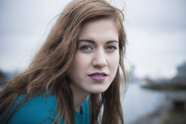 istock Attractive Young Woman At Derelict Glasgow Docks 653490178