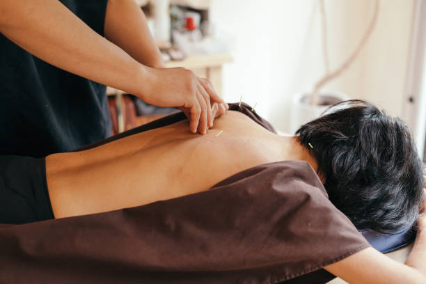 istock Acupuncture session in a Japanese medical study 653494354