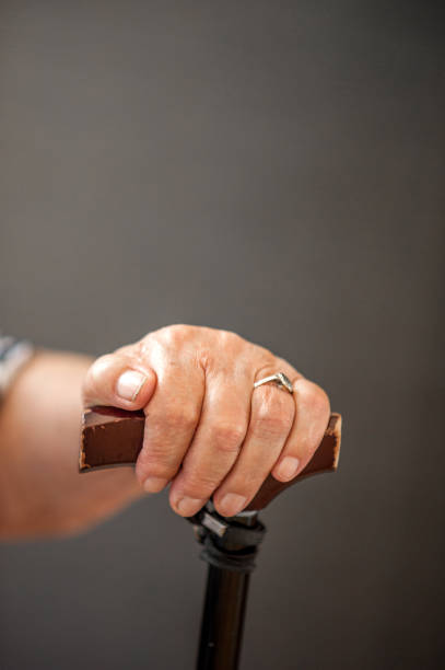 istock Senior Hand With Crutch 653495078
