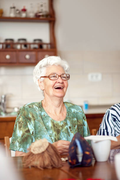 istock Smiling Senior Woman In The Community Center Doing Hand Work 653495124