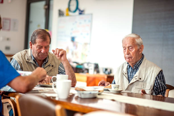 istock Seniors Having Breakfast in a Elderly Daycare Center 653495184