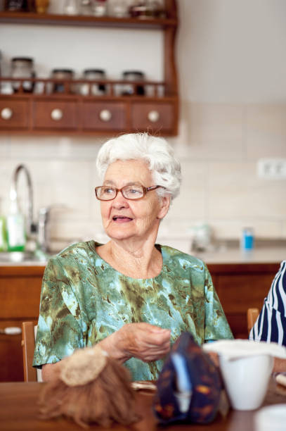 istock Smiling Senior Woman In The Community Center Doing Hand Work 653495298