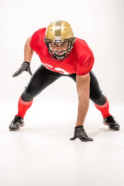 istock football player in protective sportswear 653495666