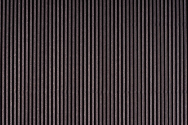 istock Striped dark gray embossed paper. Colored paper. Black texture background 653501522