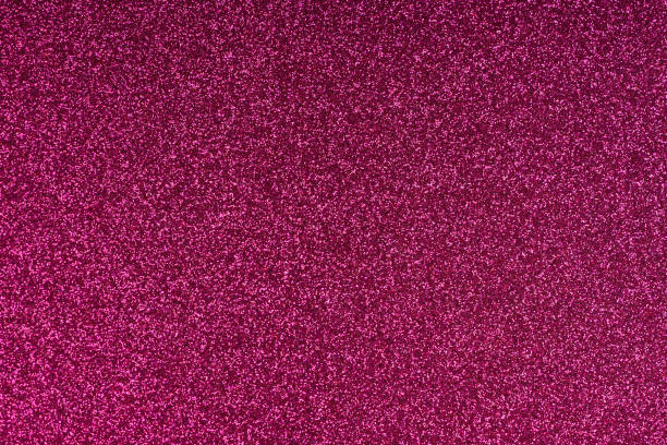 istock Glittering magenta paper sheet texture background. Sparkling golden red wine color pattern. 653501824