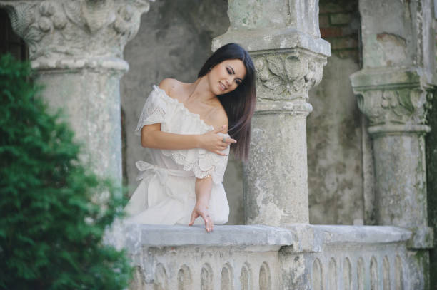 istock brunette in a dress 653510144