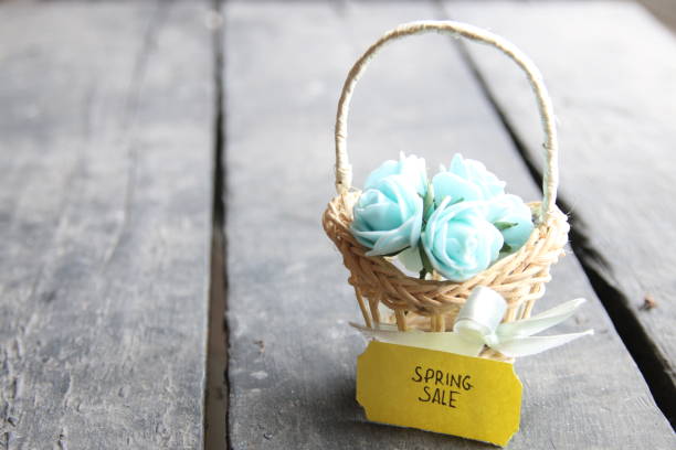 Bouquet of spring flowers in basket spring sale
