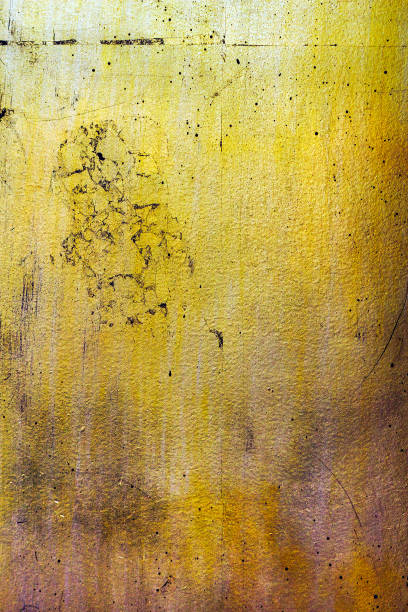 istock vertical golden wall, texture of black gold 653511154