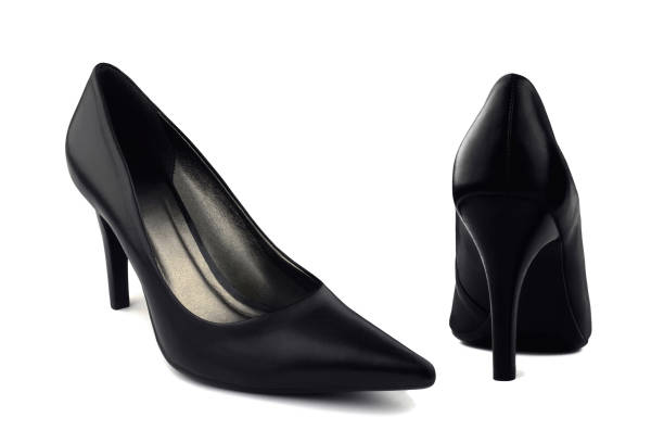 istock Black leather women's shoes with high heels isolated on white background 653516540