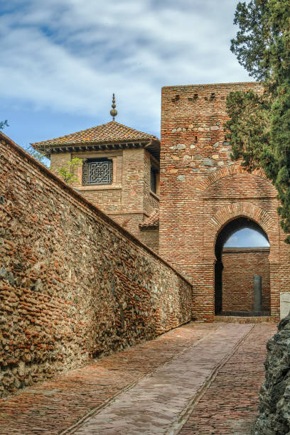 Alcazaba, Malaga, Spain The Alcazaba is a palatial fortification in Malaga, Spain. Arch in the Garden alcazaba of málaga stock pictures, royalty-free photos & images