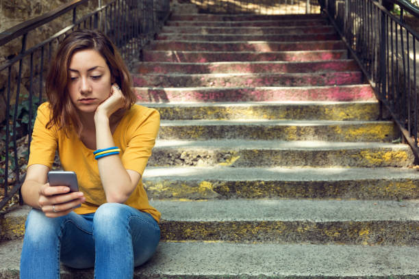 istock Girl sitting on steps 653521290