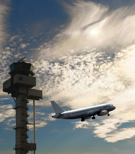 istock Fly - plane taking off and the tower Mission Control 653521780