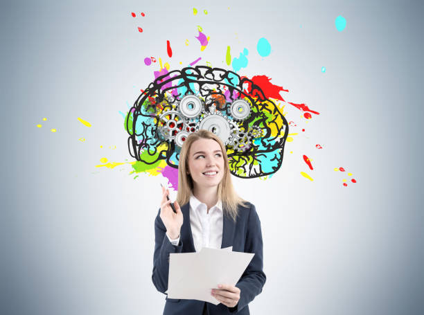 istock Woman with documents and brain with gears 653526098