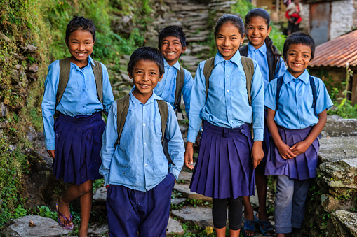 Group of Nepalese school children in village in Annapurna Conservation Area.. The Annapurna region is in western Nepal where some of the most popular treks (Annapurna Sanctuary Trek, Annapurna Circuit) are located. Peaks in the Annapurnas include 8,091m Annapurna I, Nilgiri and Machhapuchchhre. The Annapurna peaks are among the world's most dangerous mountains to climb.