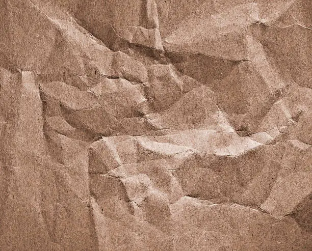 crumpled packaging paper closeup - abstract background