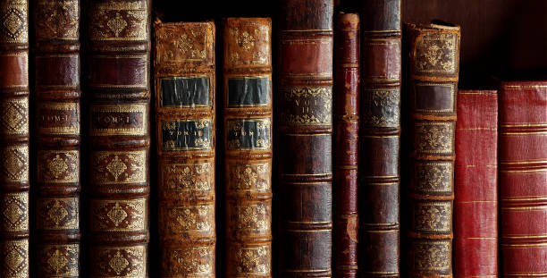 old books with vintage bindings and beautiful gilded leather book covers isolated image of old book covers, vintage book bindings, spines old book stock pictures, royalty-free photos & images