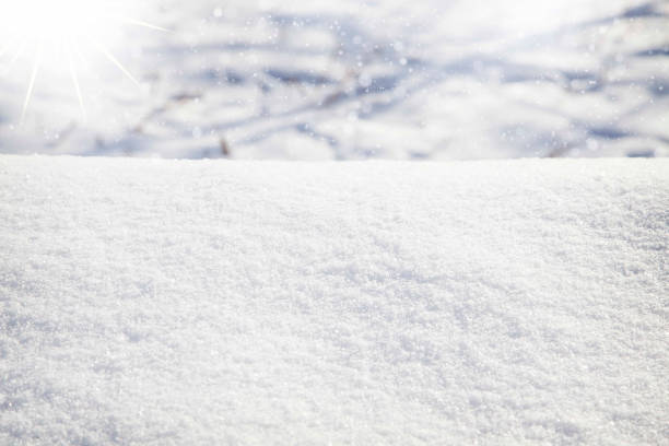 istock Winter scene background with cold sun and icy smooth snow 653539446