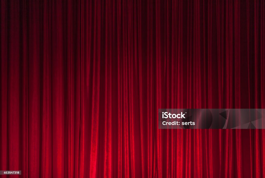 Red Theatre Stage Curtain Background Background of red spotted real theatrical velvet curtain or drapes texture Curtain Stock Photo