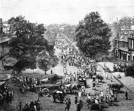 A 19th century street scene in Delhi, India, with people, cattle, carts and shops. From “Our Own Magazine” Volume XIV for 1893. Edited by T.B. Bishop and published by The Children’s Special Service Mission, London.