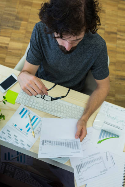 istock Graphic designer working at his desk 653587878