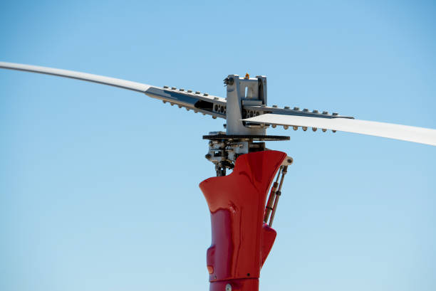 istock A gyrocopter (autogyro, gyroplane, rotaplane, helicopter) propeller closeup with blue sky on the background. 653615572