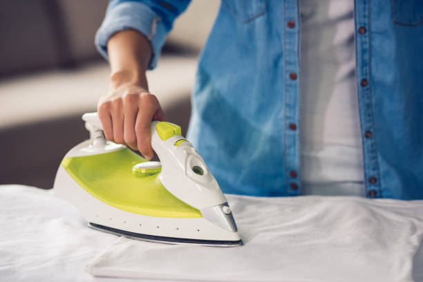 istock Beautiful woman cleaning 653746912