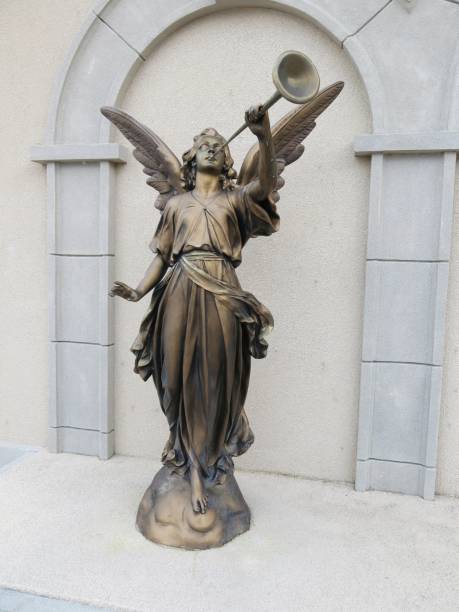 istock Proclimation Trumpet Playing Religious Angel Statue 653753488