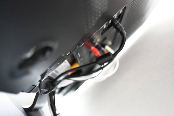 istock Various cables in the back of a LCD TV 653754724