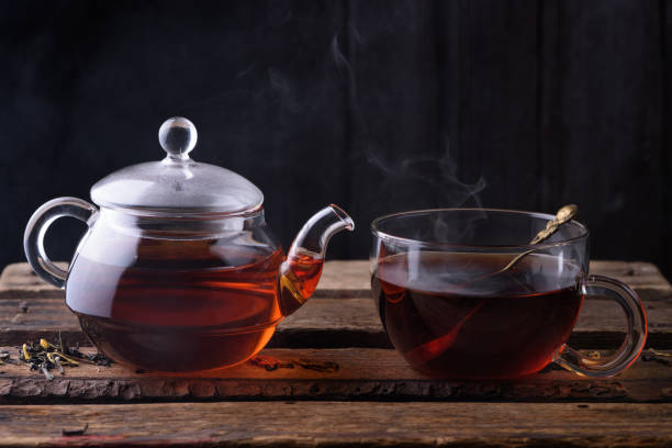istock Hot tea in glass teapot and cup 653765184