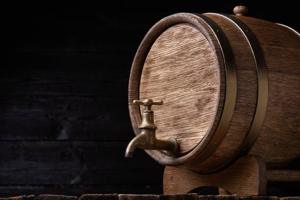 istock Vintage oak barrel on rack 653765860