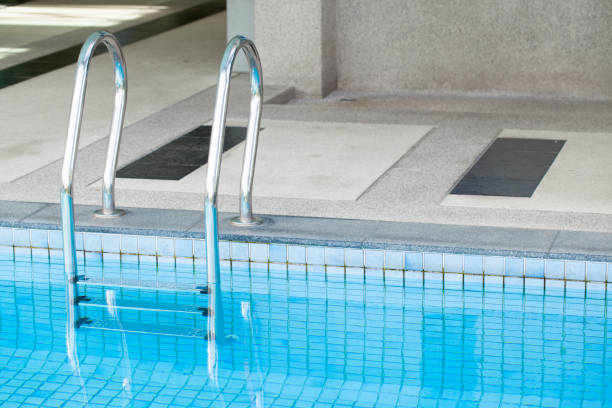 istock Stairs of the empty swimming pool 653766444