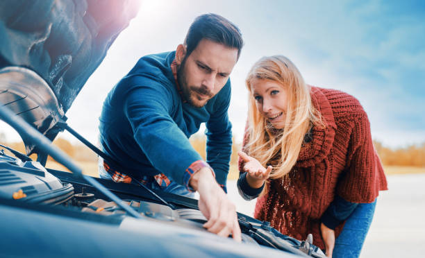 istock Problem with a car. A broken car on the road. Traveling and transportation concept 653769942