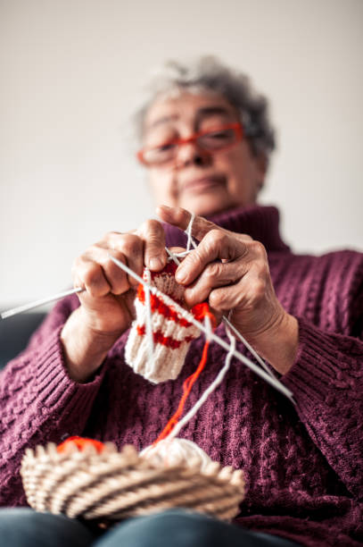istock Senior Woman Crocheting 653772866