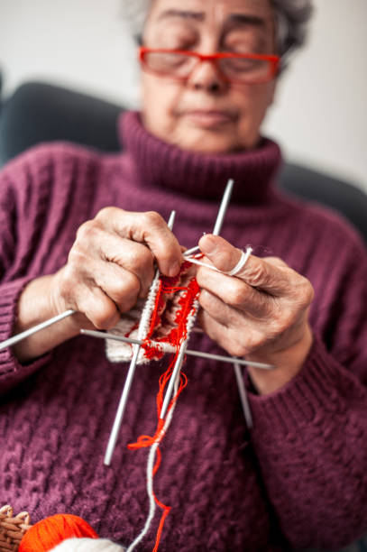 istock Senior Woman Crocheting 653772886